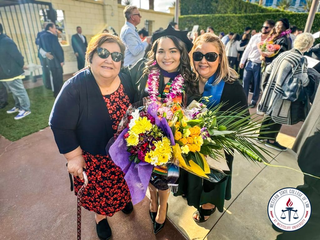Alexandria Alvarez with family at commencement.