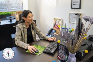 Ana Morel at her desk