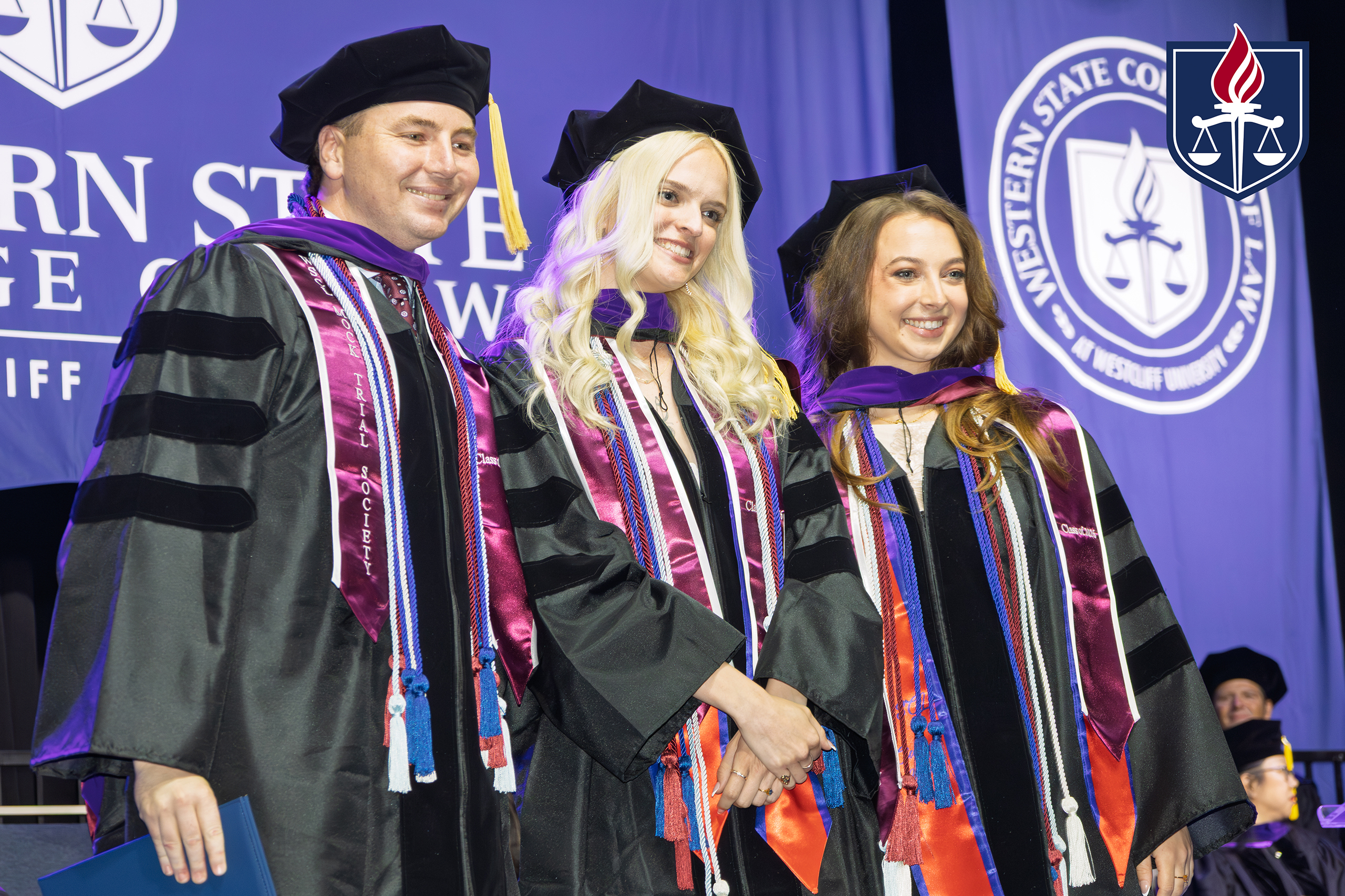 Ashlyn Hoffman at graduation with Adilyn George & friends