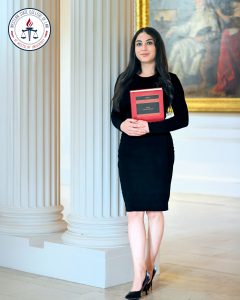 Astrid Cardona holding a book.