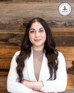 Headshot of Astrid Cardona.