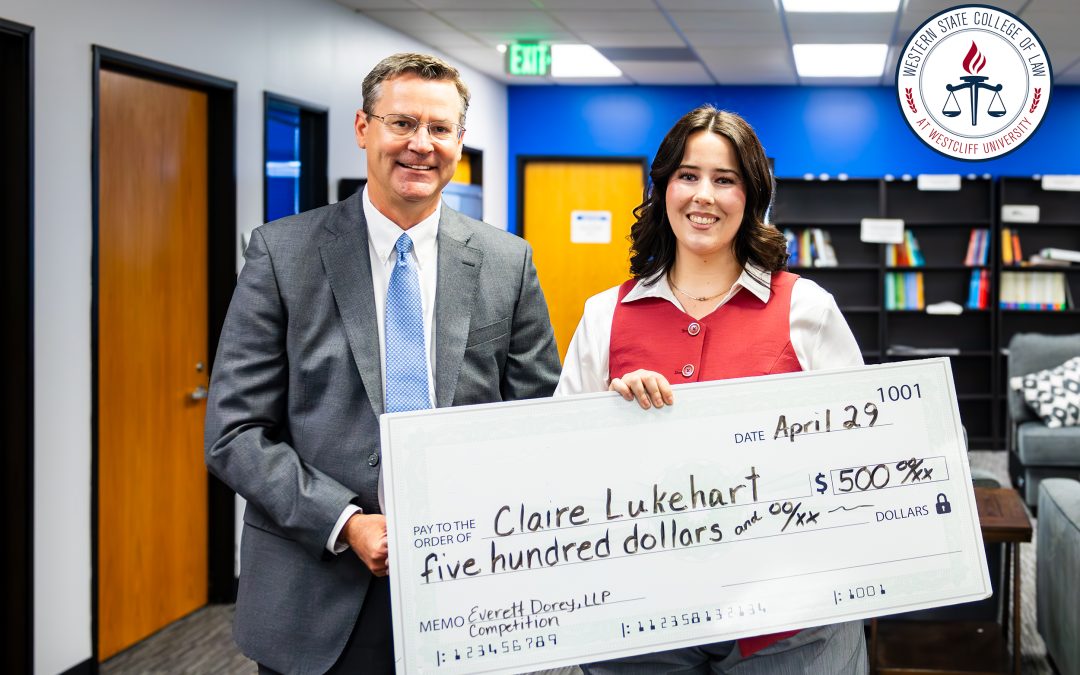 Claire Lukehart with check won from competition.