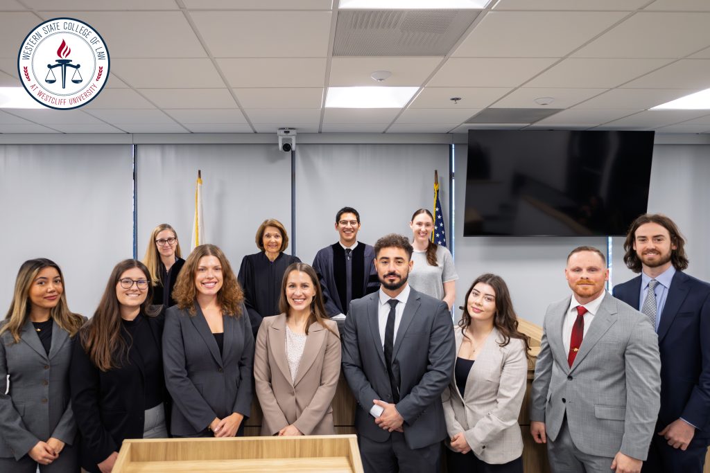 The 8 finalists and judges of the 1L Moot Court Competition sponsored by Everett Dorey