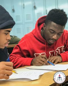 Fitzgerald Garraud teaching student.