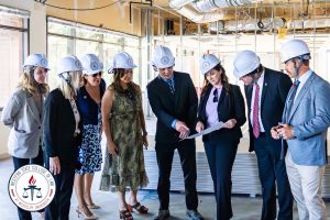 Group photo inside the new building.