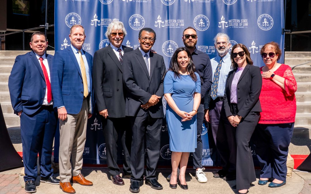 Group photo of key figures at dedication ceremony.