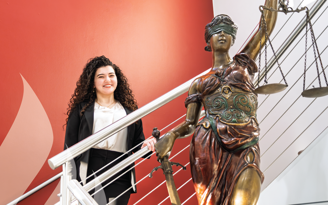Haneen Afani with Lady Justice.