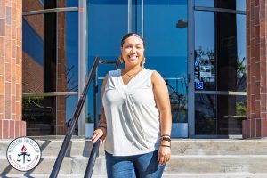 Jasmine Cleveland in front of the school.