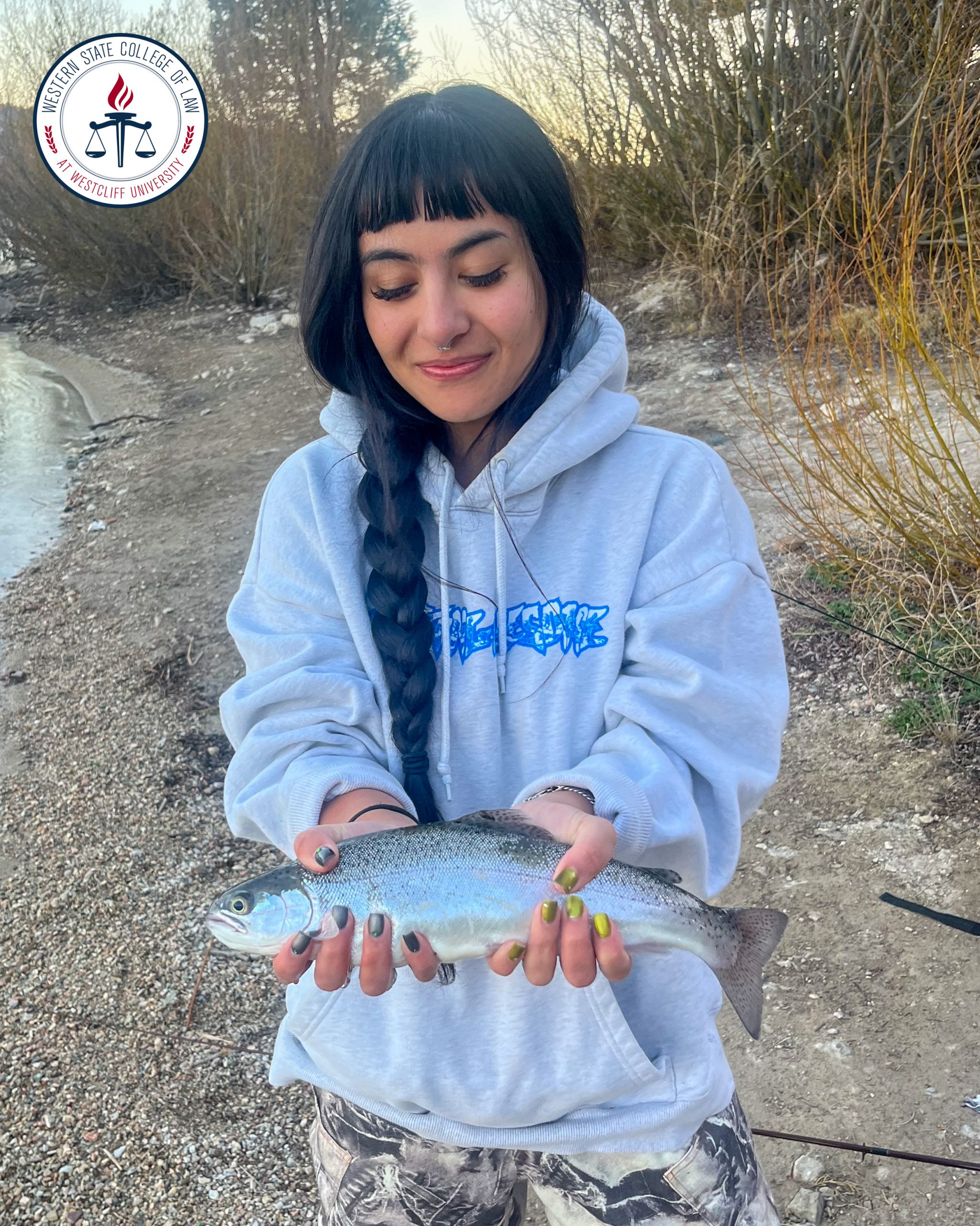 Juliet Poucher with a fish she caught