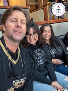 Part-time law student Olivia French with family.