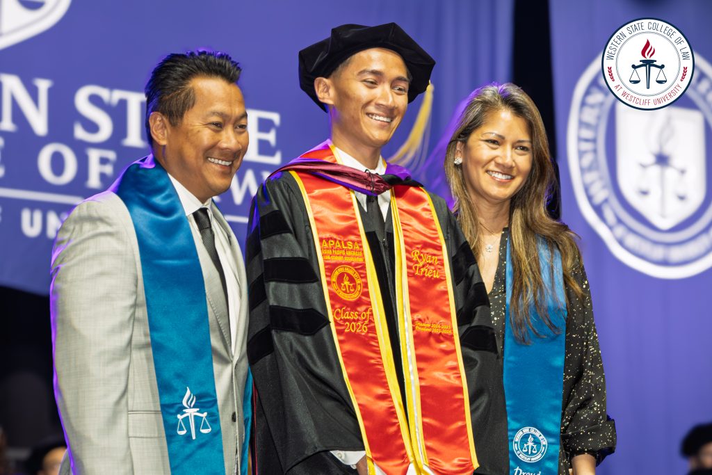 Ryan Trieu at Commencement with parents