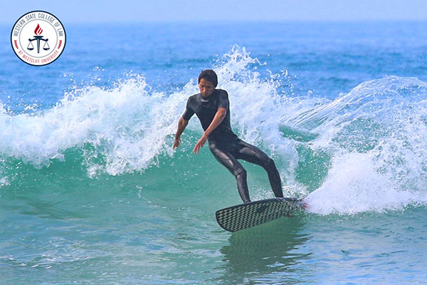 Ryan Trieu surfing