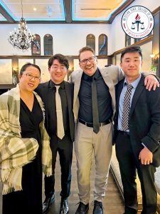Stacey Kim-Jackson with students at the Barrister's Ball.