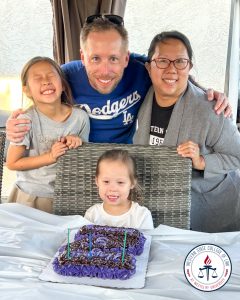 Stacey Kim-Jackson with her family on her daughter's birthday.