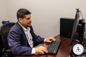 Franco Torres at his desk.